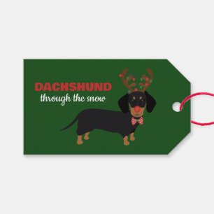 Dackel durch Schnee Niedliche Dackel Rentierhund Geschenkanhänger