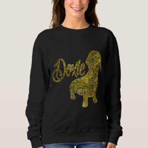 Dackel in goldenem Dekorationsmuster Sweatshirt