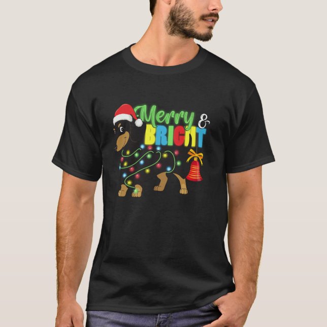 Dackel in Weihnachtslicht Weihnachtsmannmütze froh T-Shirt (Vorderseite)