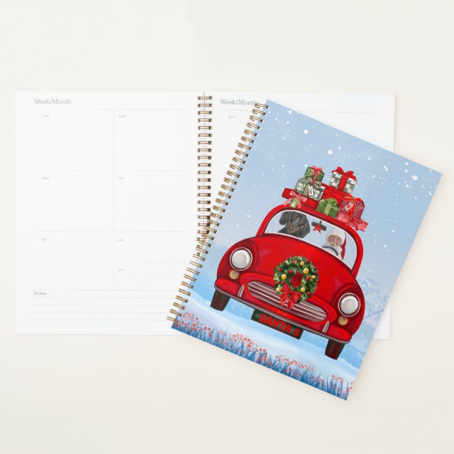 Dackel mit dem Weihnachtsmann im Auto Planer (Anzeige)