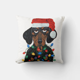 Dackel Sankt verwirrt in den Weihnachtslichtern Kissen