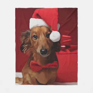 Dackel vor einem Weihnachtsgeschenk Fleecedecke