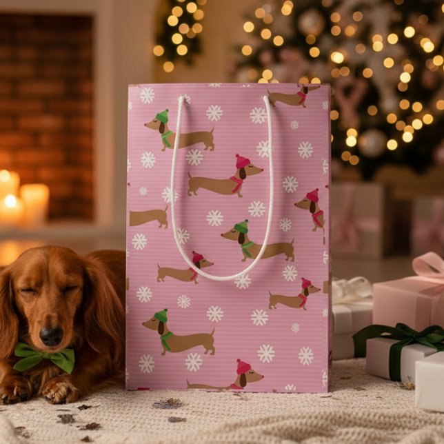 Dackel Weihnachtswrapping Paper Niedliche Schneefl Mittlere Geschenktüte (Dachshund Christmas gift with snowflakes pink and winter theme)