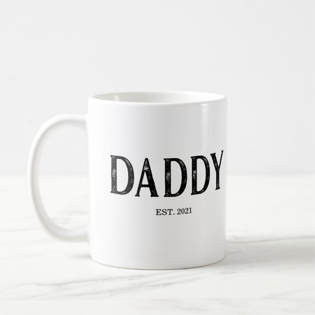 Daddy Year etabliert Kaffeetasse (Links)