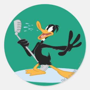 DAFFY DUCK™ Singing Runder Aufkleber