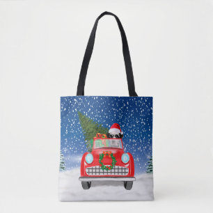 Dalmatiner fährt Auto im Schnee Weihnachten 
