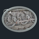 DAMTRAIN-RÄDER OVALE GÜRTELSCHNALLE<br><div class="desc">Ein Kunstdesign von Dampfzugrädern.</div>