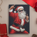 Dancing Rocker Santa Feiertagskarte<br><div class="desc">Dieses Design entstand durch digitale Kunst und kann in dem Bereich personalisiert sein, der durch das Ändern des Fotos und/oder Textes zur Verfügung gestellt wird. Oder Sie können es anpassen, indem Sie den Mausklick auswählen, um weitere Optionen anzupassen, um die Farbe des Hintergrunds zu löschen oder zu ändern, Text hinzuzufügen,...</div>