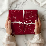 Dark Red Merry Christmas Geschenkpapier<br><div class="desc">Traditionelles,  schlicht gefärbtes Packpapier. Ein modernes Bohemisch dunkles Rot mit frohen Weihnachten in handgeschriebenem Schriftart,  gedruckt in einem sich wiederholenden Muster. Dunkelrot frohe Weihnachtswrapping Paper.</div>
