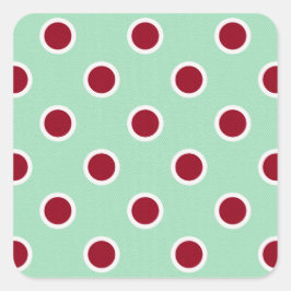 Dark Red Polka Dots auf blassgrün Quadratischer Aufkleber