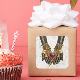 Das Angebot - Herz in den Händen Quadratischer Aufkleber