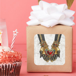 Das Angebot - Herz in den Händen Quadratischer Aufkleber