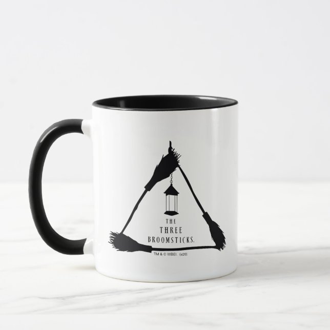 DAS DREI BROOMSTICKS™-Logo Tasse (Links)