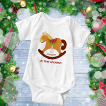 Das erste Weihnachtsrockpferd des Babys
