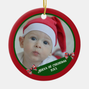 Das erste Weihnachtsschmuck des Babys Fotovorlag