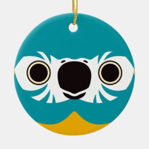 Das Gesicht einer bläulich gefallenen Ara Keramik Ornament