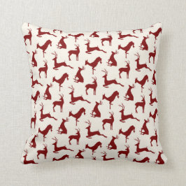 Das Hirsch und das Buckmuster in Rot auf Creme lau Kissen