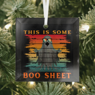 Das ist ein Bootblatt, das lustig ist zwischen Gei Ornament Aus Glas