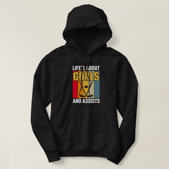 Das Leben dreht sich um Ziele und Assists Hockey Hoodie (Design vorne)
