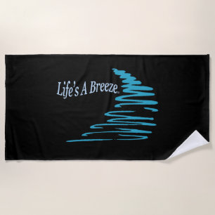 Das Leben ist ein Breeze® Squigly Lines, die mit d Strandtuch