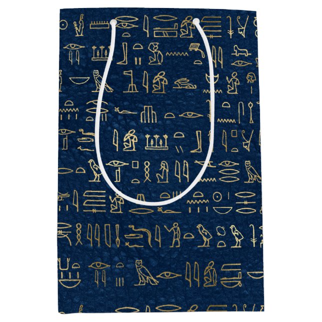 Das Muster der ägyptischen Hieroglyphen aus Gold u Mittlere Geschenktüte (Vorderseite)