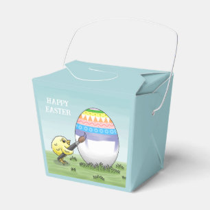 Das Osterei wird von dem gelben Küken bemalt Geschenkschachtel