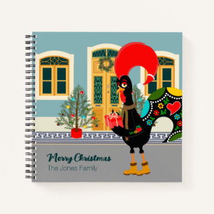 Das portugiesische Rooster mit einem Weihnachtsges Notizbuch
