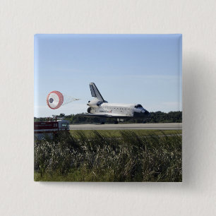 Das Space Shuttle Atlantis entfaltet seinen Drag R Button