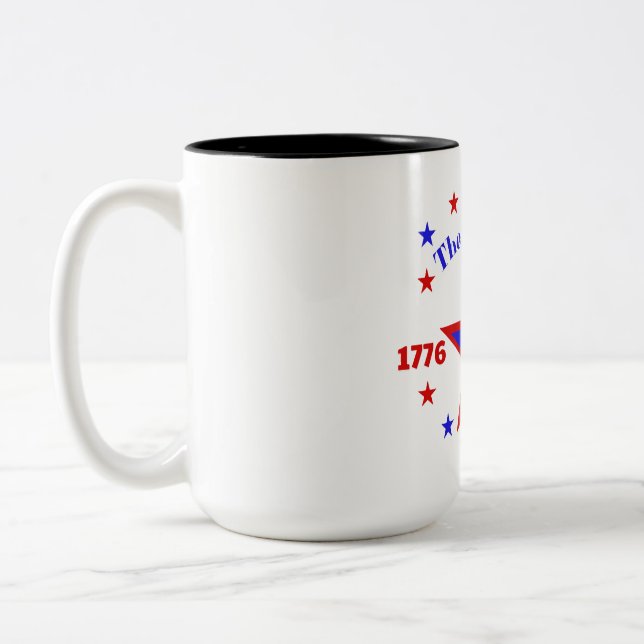 DAS SPIRIT DER 26 - SEMIQUINCENTENNIAL ZWEIFARBIGE TASSE (Links)
