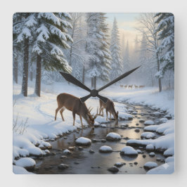 Deer drinking from a snow covered brook -  quadratische wanduhr