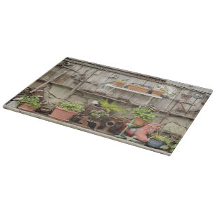 Dekorationen auf Holzzaun, Schneidebrett