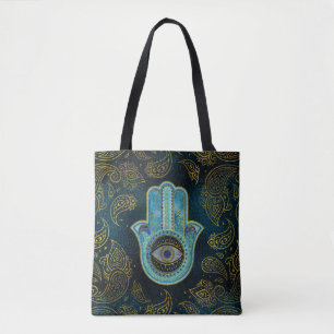 Dekorative Hamsa Hand mit Paisley-Hintergrund