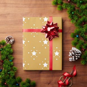 Dekorative Sterne auf goldenem Hintergrund Geschenkpapier