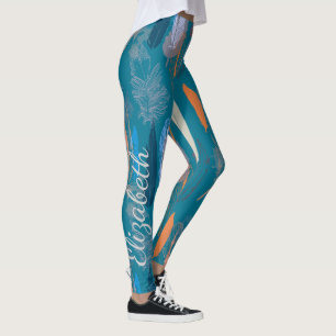 Dekorativer Feder-Entwurf in blauem Leggings