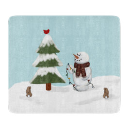 Dekorieren der Weihnachtsabteilung des Baumes Schneidebrett