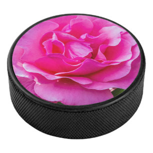 Delikate rosa Rosa Rose. Eishockey Puck