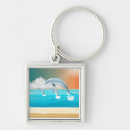 Delphine, die im Ozean brechen Schlüsselanhänger