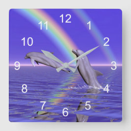Delphine und Regenbogen Quadratische Wanduhr