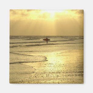 Den Strand bei Sonnenuntergang genießen Magnet