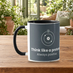 Denke wie ein Proton Schwarzer Kombi-Becher Tasse