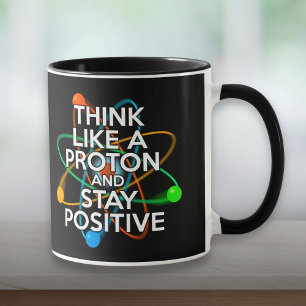 DENKEN SIE WIE EIN PROTON UND BLEIBE POSITIV TASSE