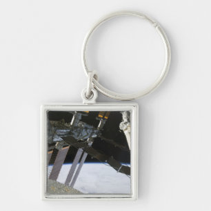 Der Arm der Bemühung unter internationalem Schlüsselanhänger