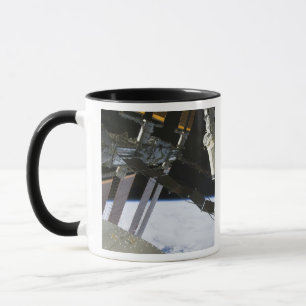 Der Arm der Bemühung unter internationalem Tasse