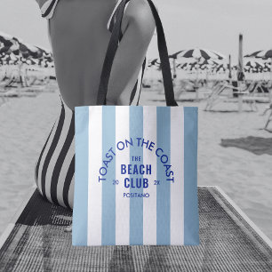 Der Beach Club Toast auf dem blauen Streifen der K