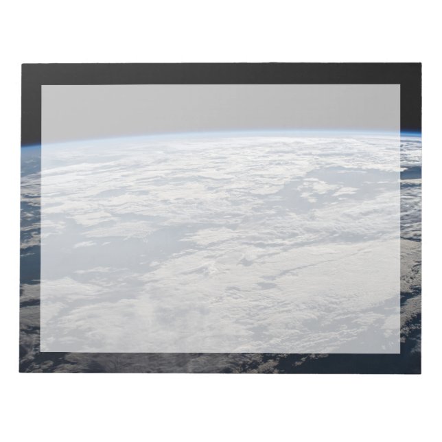 Der Erdwall über einem bewölkten Western Australie Notizblock (Vorderseite)