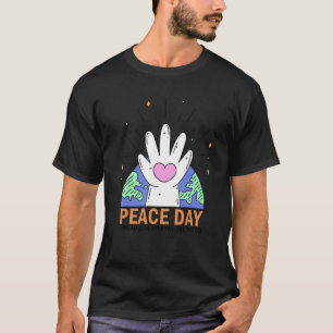 Der Friedenstag verbreitet Liebe überall, wo man h T-Shirt