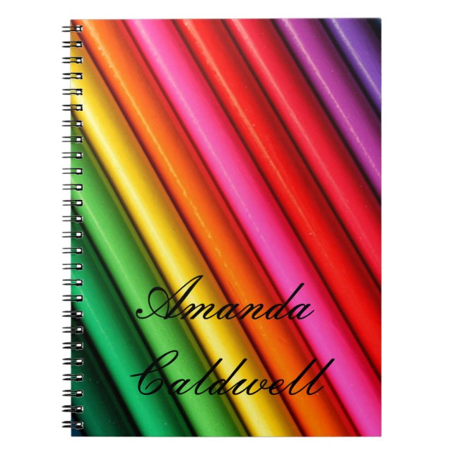 Der gefärbte Regenbogen zeichnet Notizbuch an Notizblock (Vorderseite)