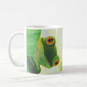 Der große mit Augen grüne Frosch hinter dem Lilien Kaffeetasse