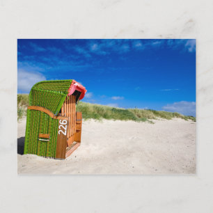 Der grüne Strandstuhl in der Nordsee Postkarte