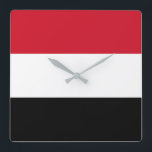 Der Jemen-Flagge Quadratische Wanduhr<br><div class="desc">Die Jemenflagge ist ein horizontales triband. Die verwendeten Farben in der Flagge sind rot,  weiß,  Schwarzes. Der Anteil der Jemenflagge ist 2: 3. Die Flagge von Yemen wurde im Jahre 1990 adoptiert. Der erste Gebrauch von dem gegenwärtigen Flaggenentwurf war im Jahre 1990.</div>